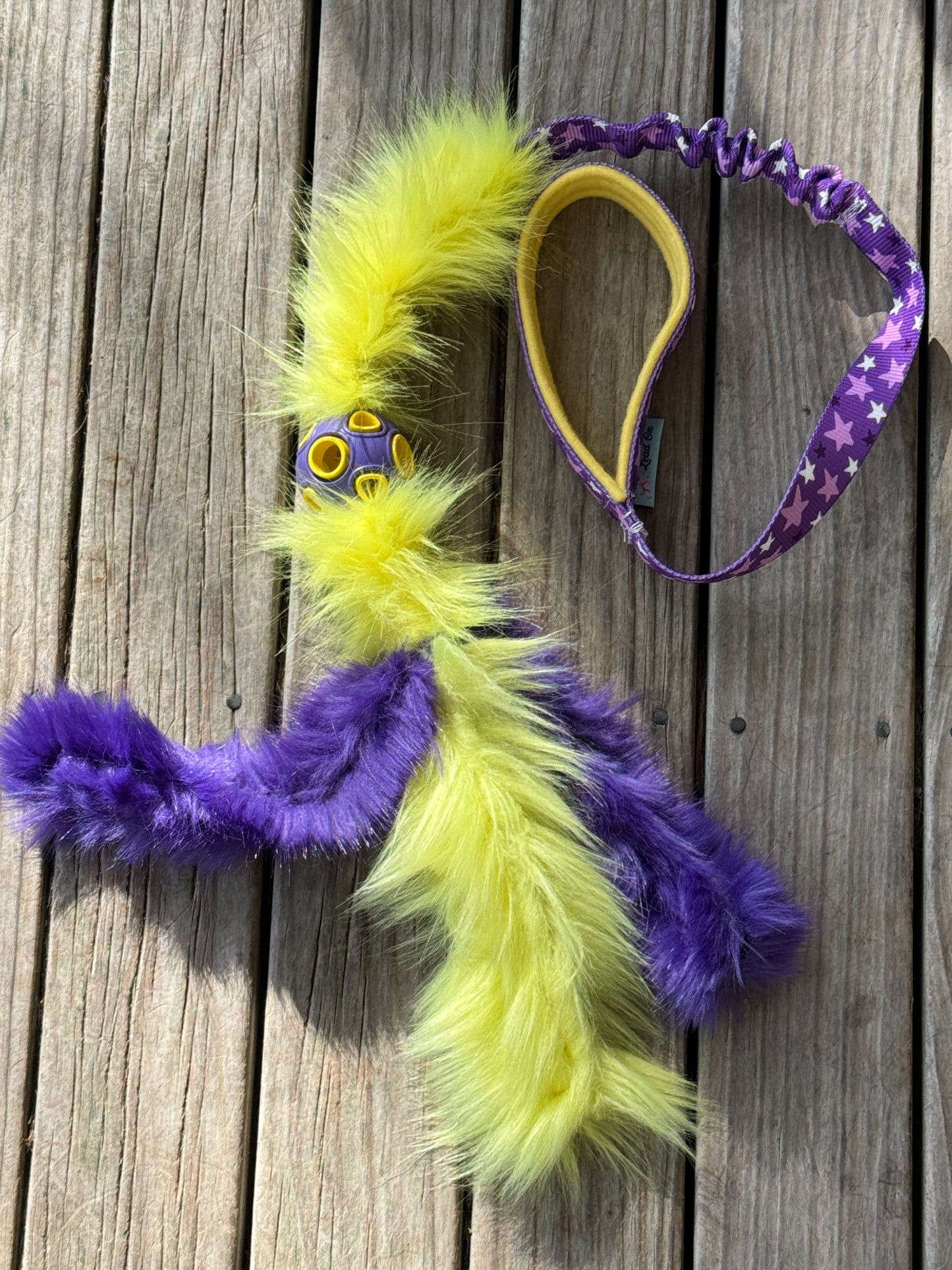 Chaser with faux fur tassels