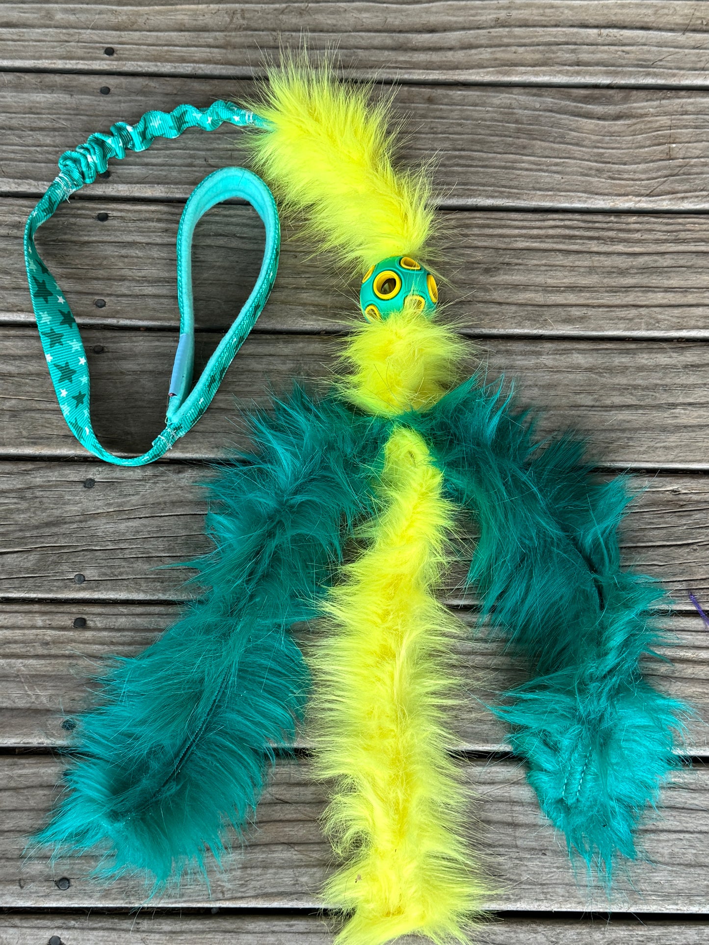 Chaser with faux fur tassels