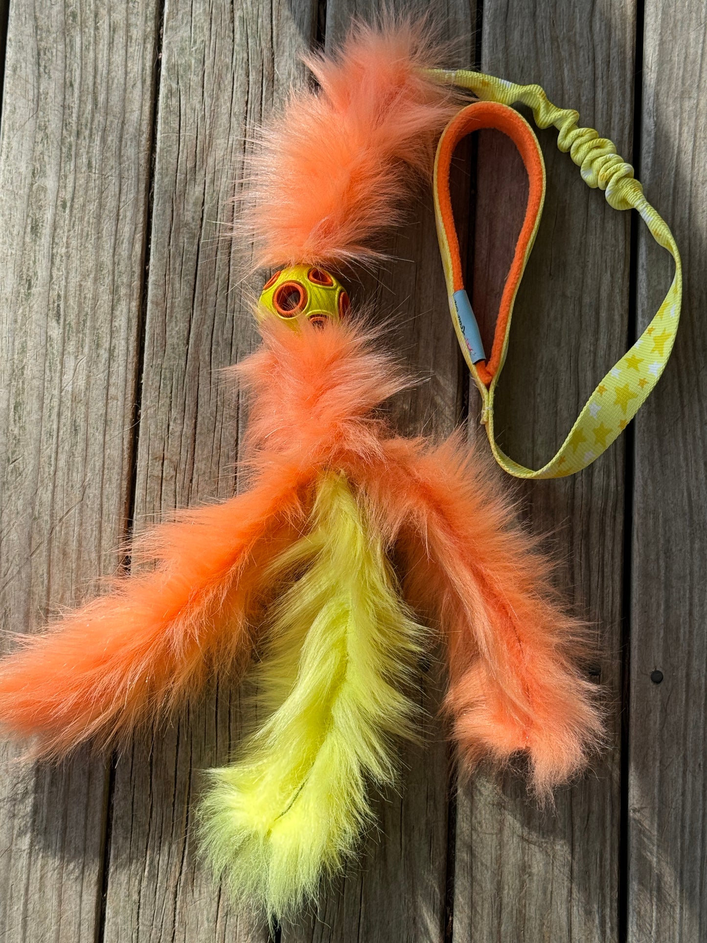 Chaser with faux fur tassels