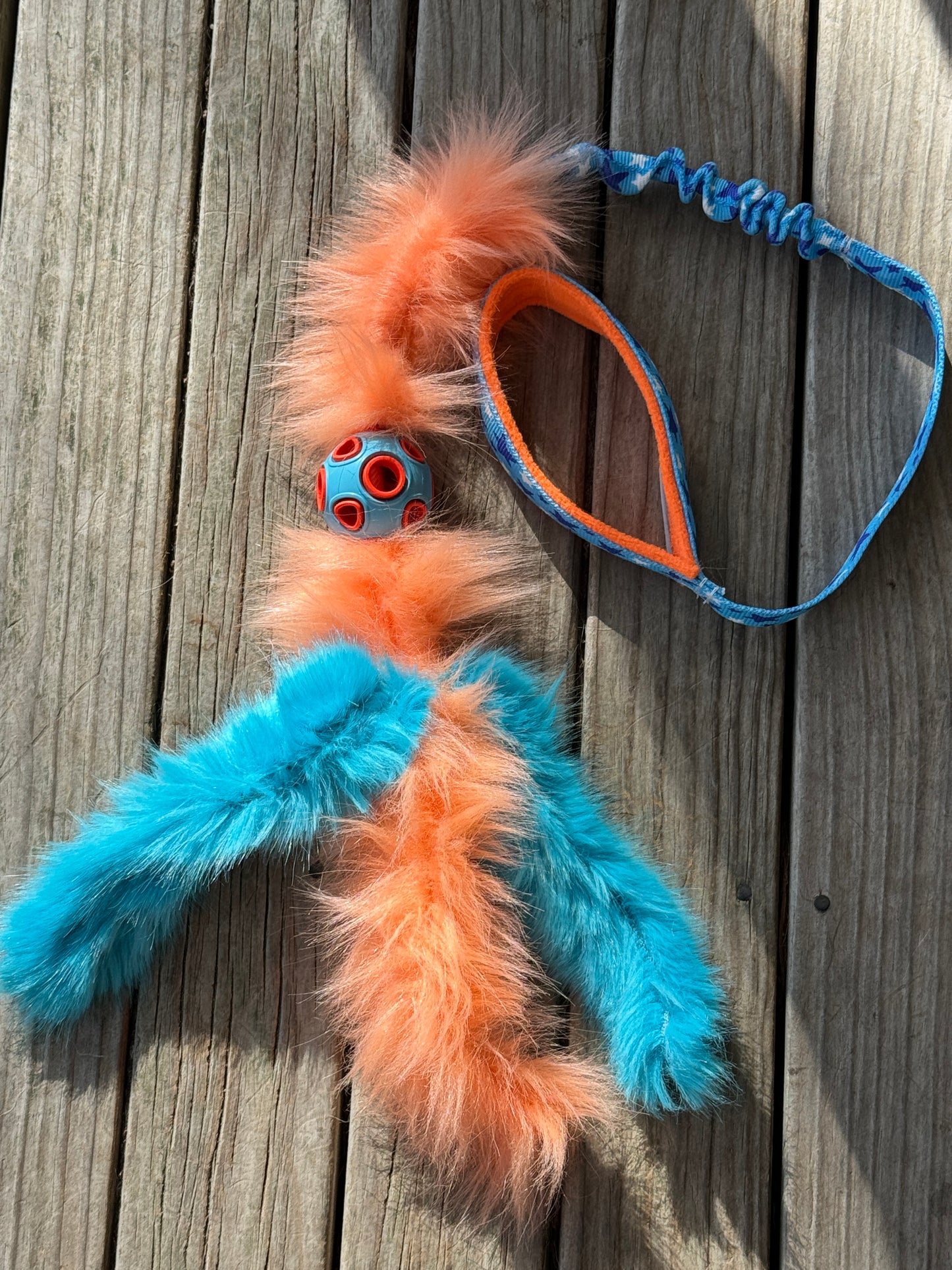 Chaser with faux fur tassels