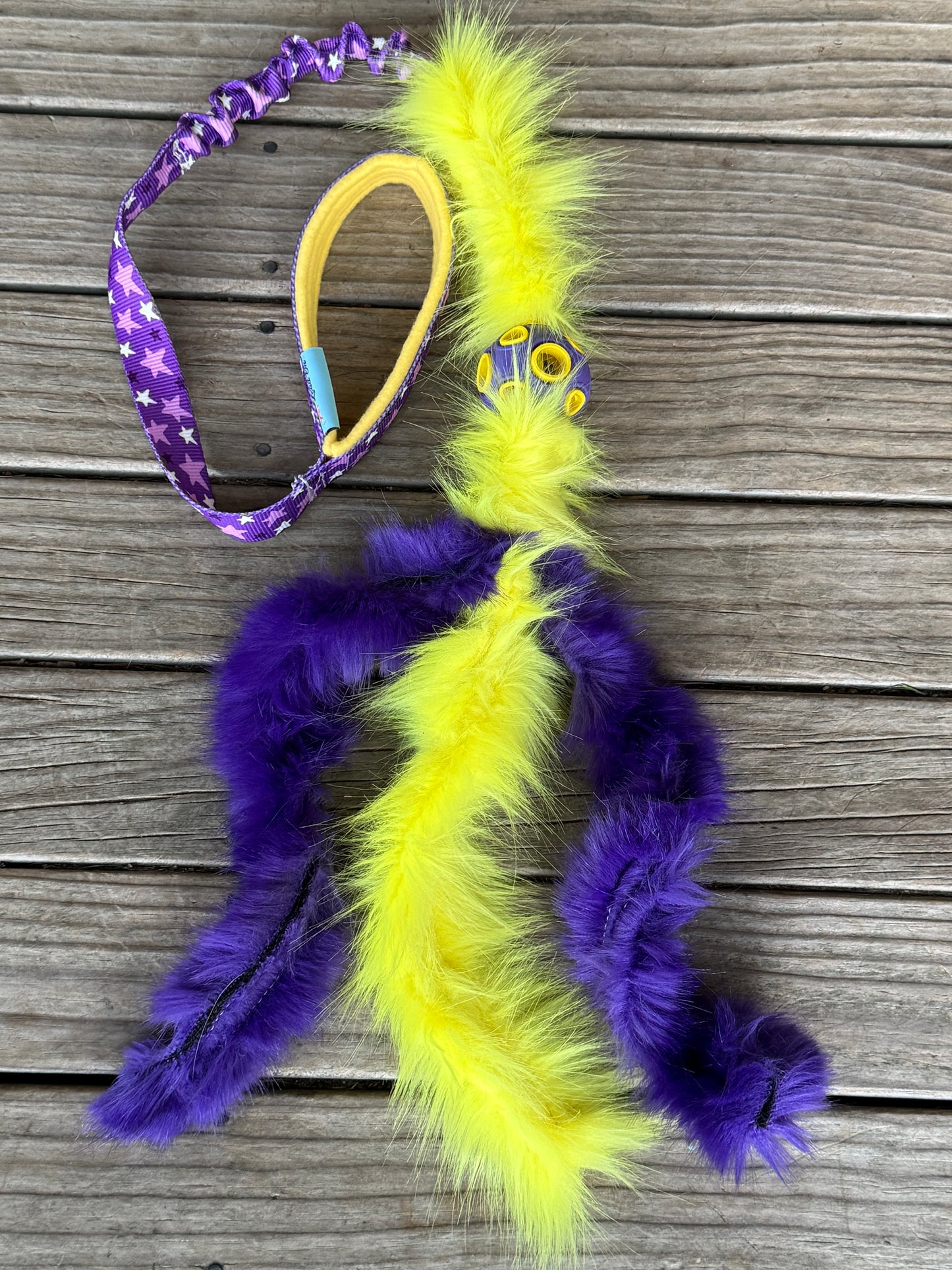 Chaser with faux fur tassels
