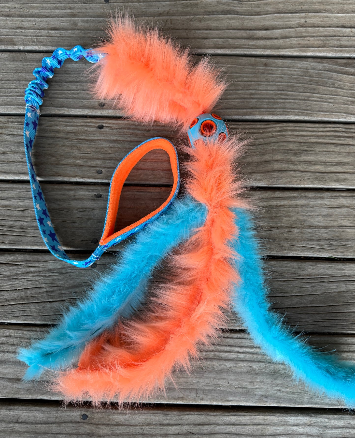 Chaser with faux fur tassels