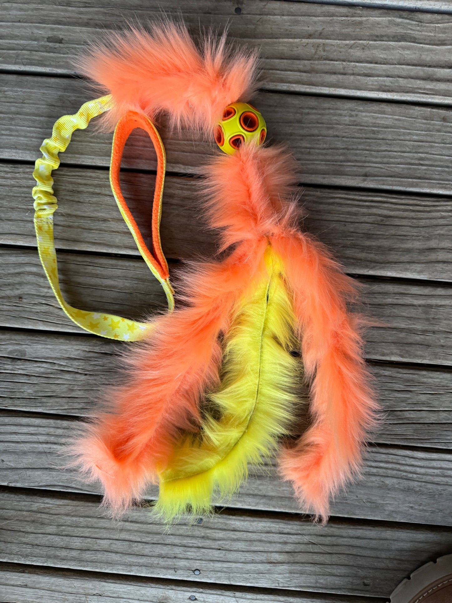 Chaser with faux fur tassels