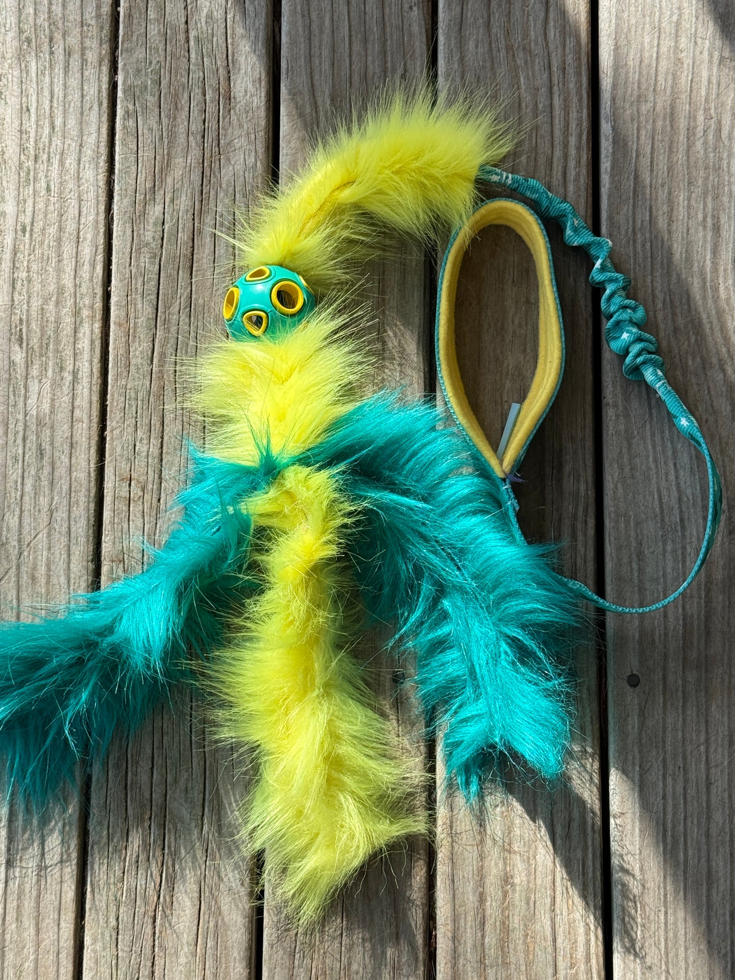 Chaser with faux fur tassels